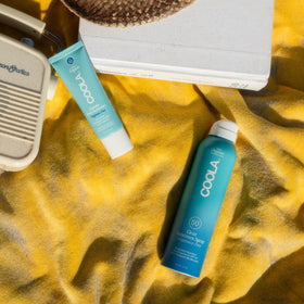 COOLA sunscreen under foundation showing non-greasy makeup-compatible benefit