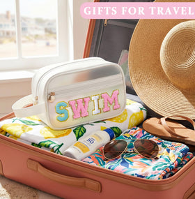 COSHAYSOO travel lifestyle scene on beach towel showing waterproof protection for toiletries