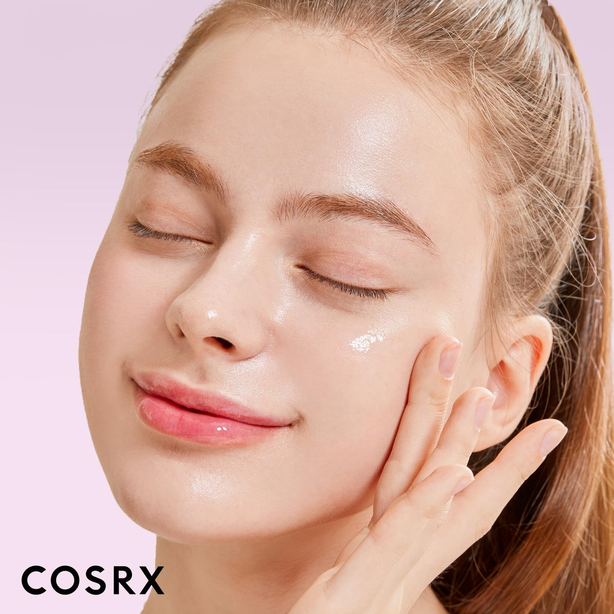 COSRX mini serum held in hand for scale and portability benefit