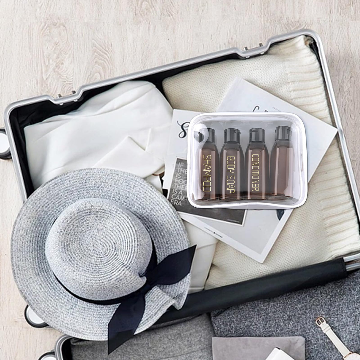 Cosywell bottles beside a passport illustrating compact, TSA-ready size
