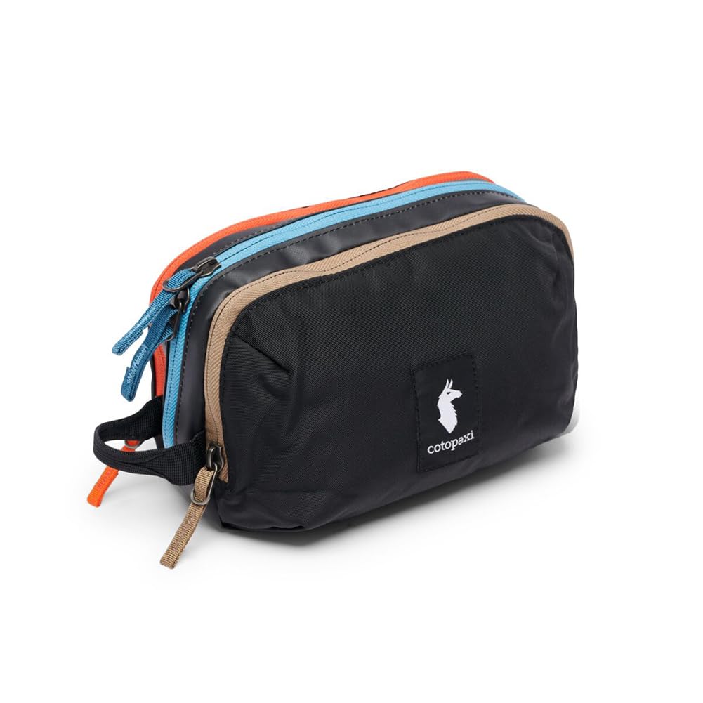 Cotopaxi Nido accessory bag front view in CADA Dia black showing durable exterior and grab handle benefit