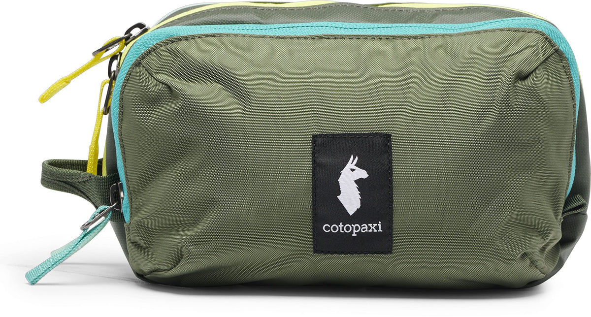 Cotopaxi Nido interior close-up displaying three compartments and secure zippered pocket