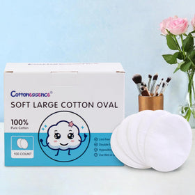 Cottonessence pack beside a ruler showing pad dimensions and scale