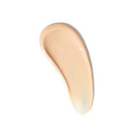 CoTZ applied on cheek from hand demonstrating easy blending and natural finish