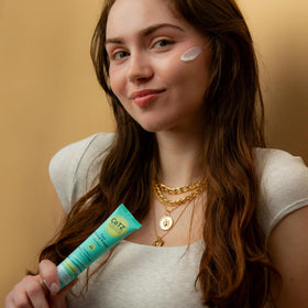 CoTZ placed on vanity with makeup illustrating primer use before foundation
