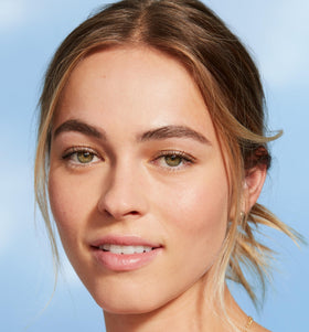 COVERGIRL split-face before and after showing visible evening of skin tone