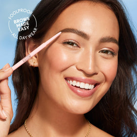 COVERGIRL pencil beside ruler showing compact travel-friendly size