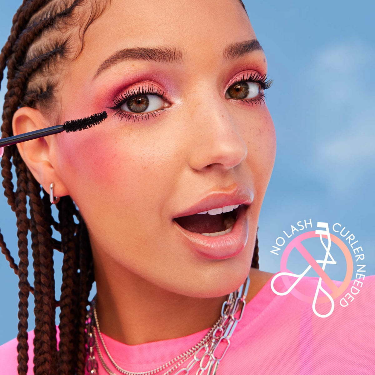 COVERGIRL mascara tube next to ruler showing compact 0.30oz size for travel
