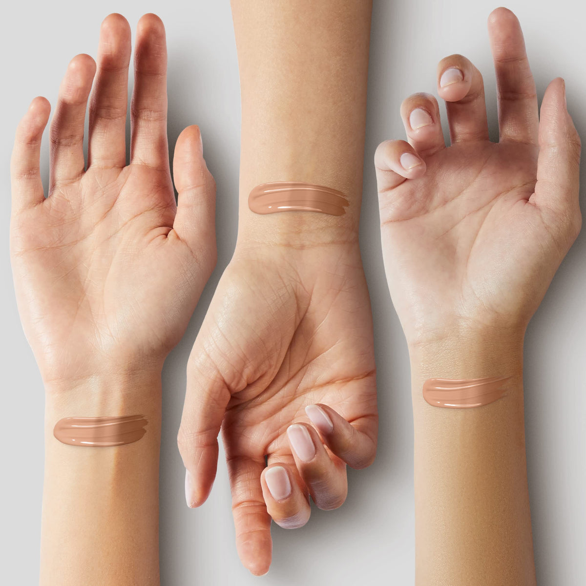 COVERGIRL & Olay swatches on arm showing color 245 Warm Beige and even coverage benefit