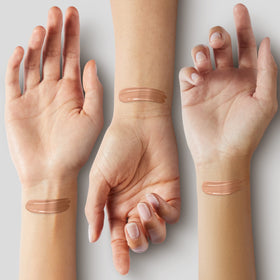 COVERGIRL & Olay swatches on arm showing color 245 Warm Beige and even coverage benefit