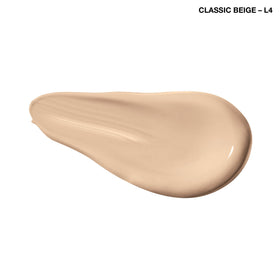 COVERGIRL TruBlend bottle held in hand showing compact 1 fl oz size for travel convenience