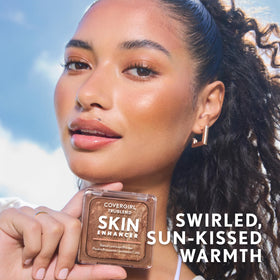COVERGIRL TruBlend bronzer swatch on skin demonstrating buildable warm color
