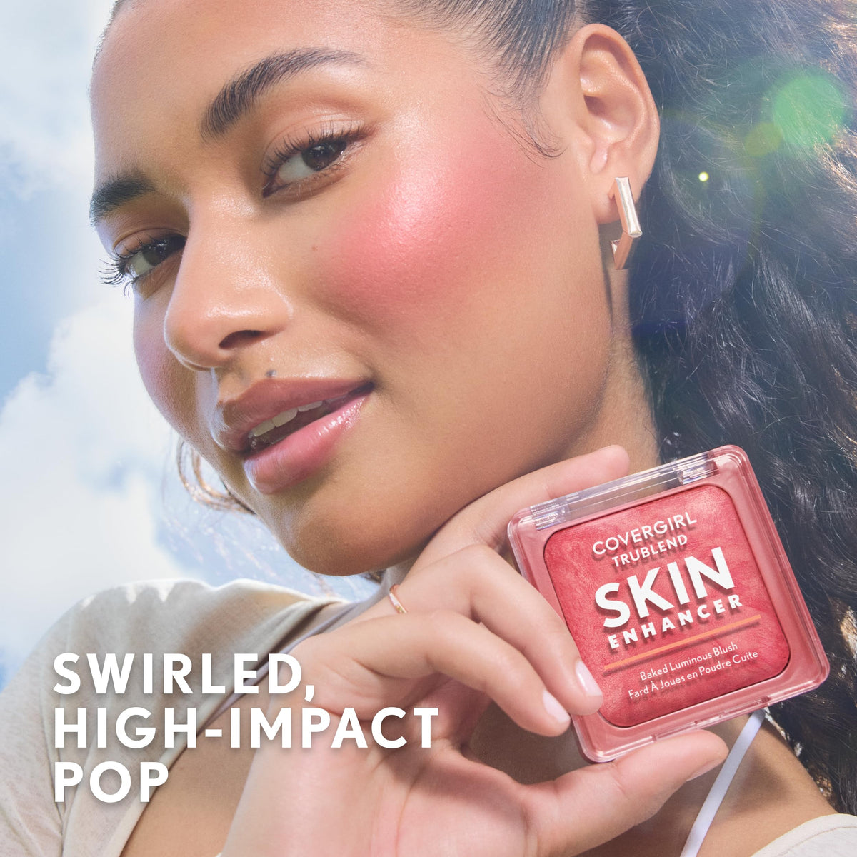 COVERGIRL open compact with brush applying color for buildable, natural-looking flush