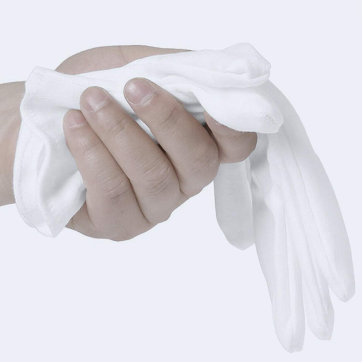 COYAHO gloves laid flat beside a ruler to show length