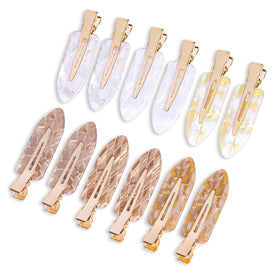 Cptots front packaging showing 12 white gold creaseless clips, organized and travel-ready