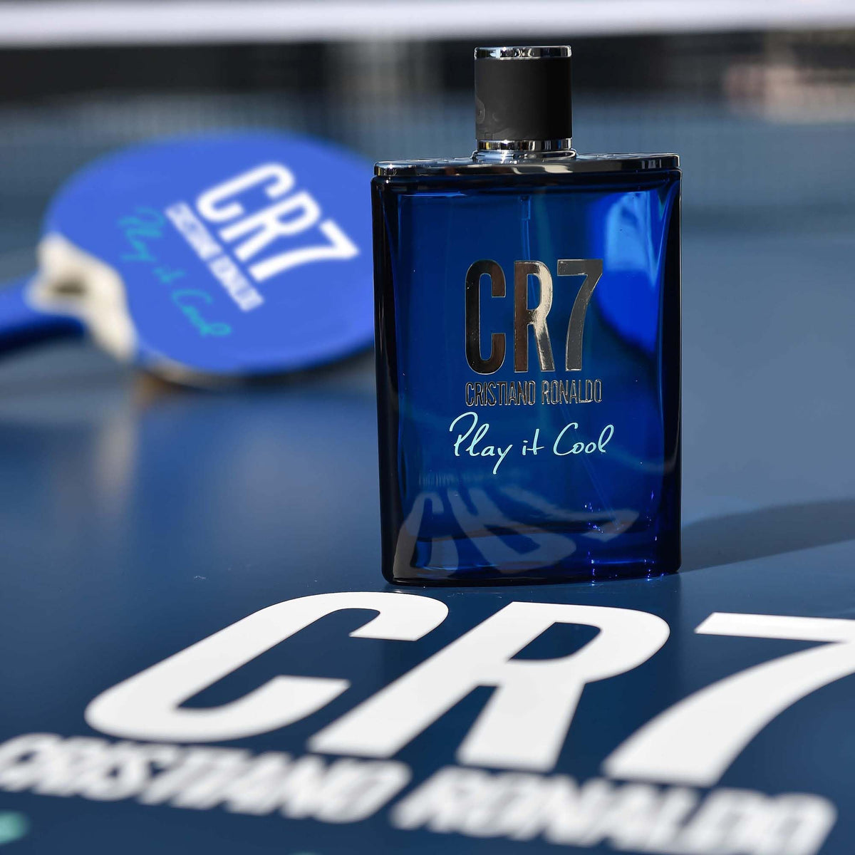 CRISTIANO RONALDO CR7 Play It Cool texture with oil drops, suggests aromatic complexity