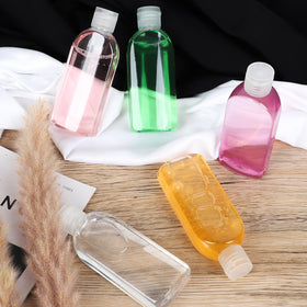 Craftisan bottles beside a credit card showing compact TSA-approved size