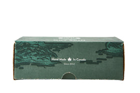 Crate 61 Organics bar held in hand to show actual size and portability benefits