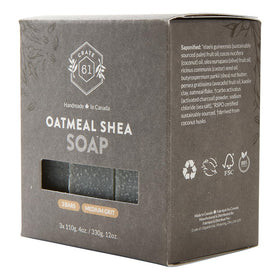 Crate 61 Organics bar held in hand to show size and dense, long-lasting cold-process feel