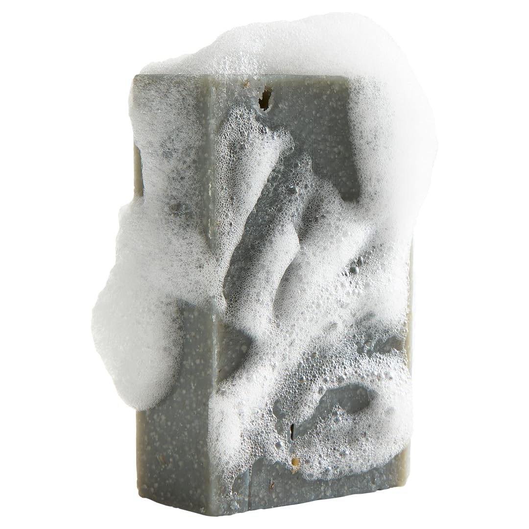 Crate 61 Organics rich lather on skin during shower demonstrating creamy cleansing and hydration