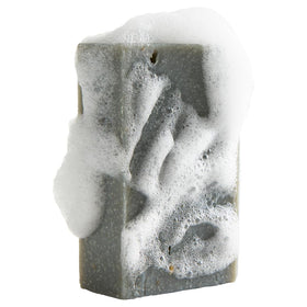 Crate 61 Organics rich lather on skin during shower demonstrating creamy cleansing and hydration