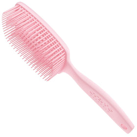 Crave Naturals detangling curly hair with brush preserving curl pattern and reducing frizz