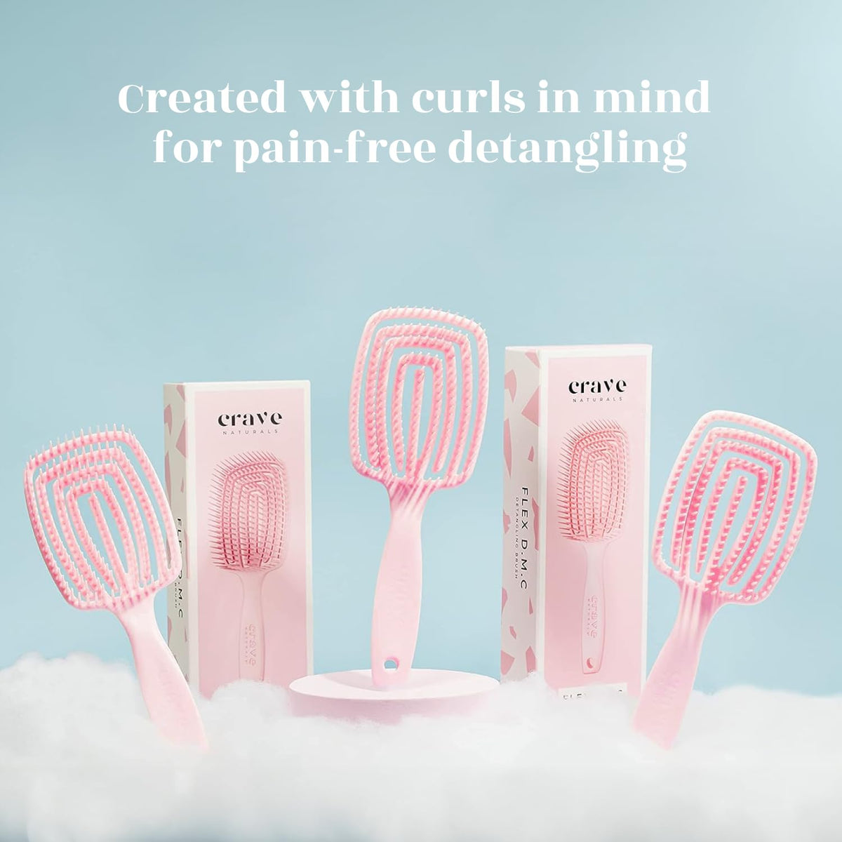 Crave Naturals side profile of FLEX DMC brush highlighting slim paddle and flexible pad, comfortable styling