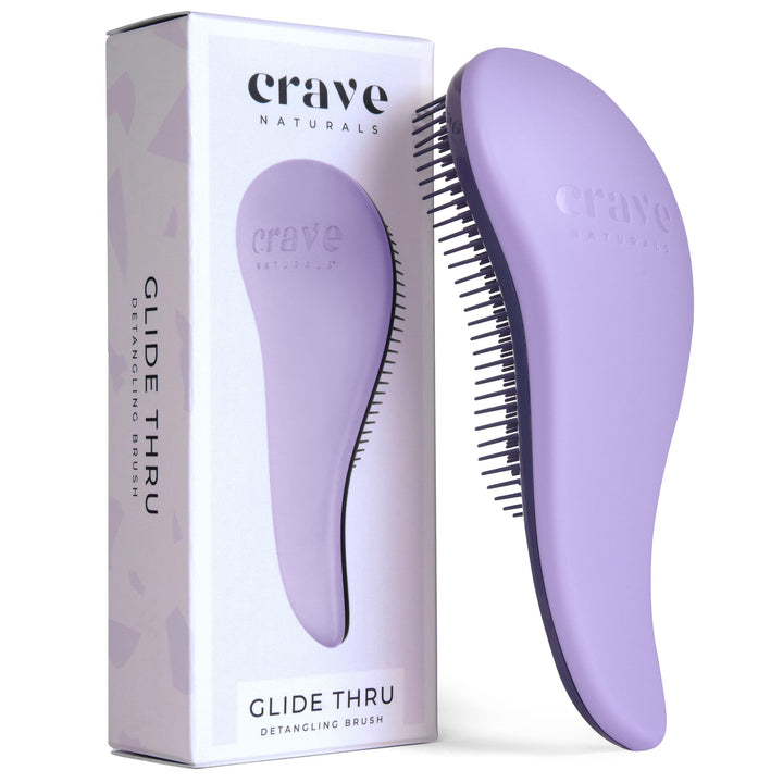 Crave Naturals front view of purple Glide Thru brush showing compact shape and easy grip
