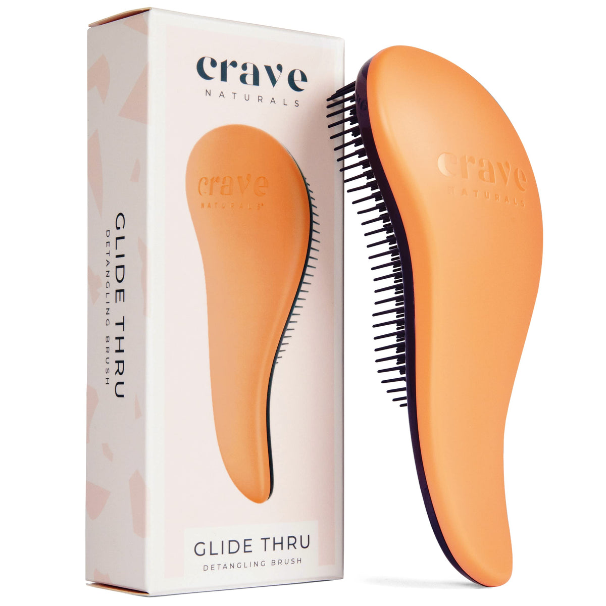 Crave Naturals front view of coral Glide Thru brush shows compact shape and grip