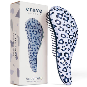 Crave Naturals front view of detangler brush shows compact design and easy grip