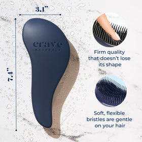 Crave Naturals brush held in hand to show size and ergonomic advantage