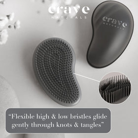 Crave Naturals brush inside a cosmetic bag demonstrating portable convenience