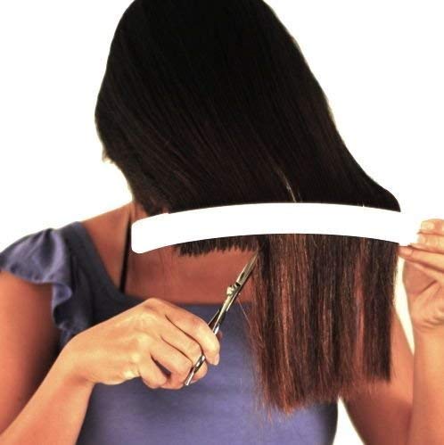 CreaClip in use cutting bangs illustrating neat results and time savings
