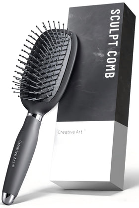 Creative Art front view of gray men's detangling brush showing shape and benefit