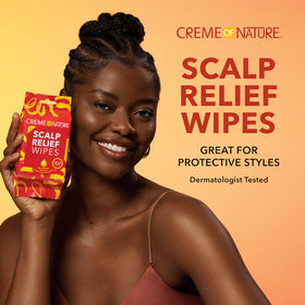 Creme of Nature wipe held in hand demonstrating easy use