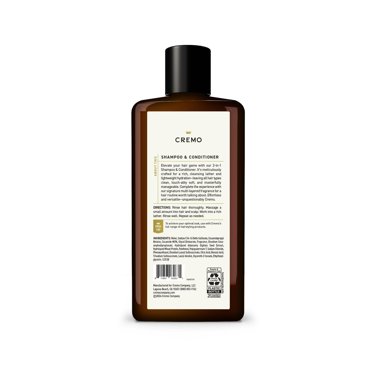 Cremo bottle held by hand to show 16 oz size and travel-friendly benefit