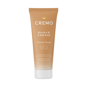 Cremo front packaging of Coconut Mango shave cream showing bottle and brand benefits