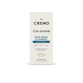 Cremo bottle on bathroom shelf paired with grooming items for routine synergy