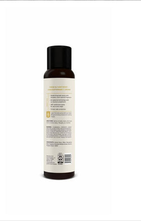 Cremo bottle on bathroom counter with towel, illustrating coordinated grooming routine