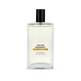 Cremo bottle front view showing elegant label and travel-friendly size