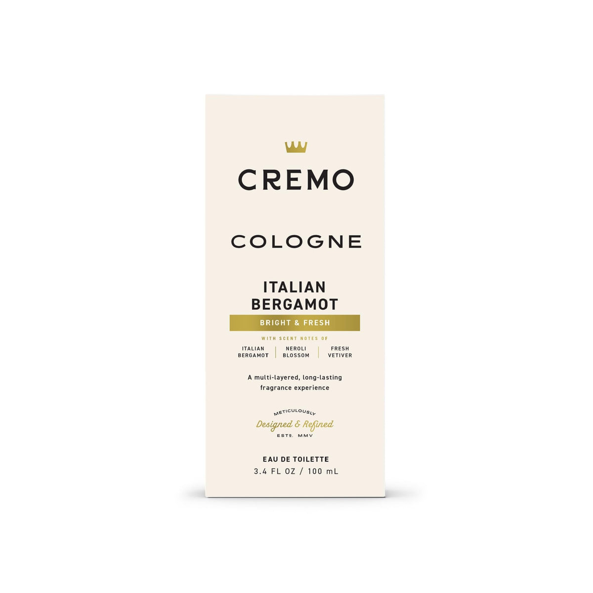 Hand holding Cremo bottle showing scale and carry-on suitability