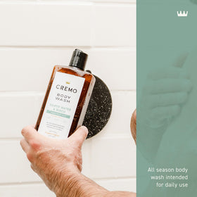 Cremo close-up of rich lather texture on hand, demonstrating moisturizing foam