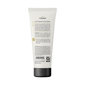 Cremo bottle beside razor in bathroom showing easy at-home barber-quality shave