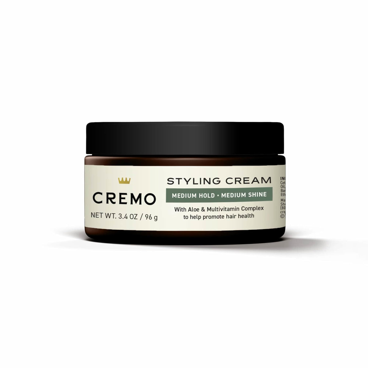 Cremo next to common items to show the 3.4 oz size for packing ease