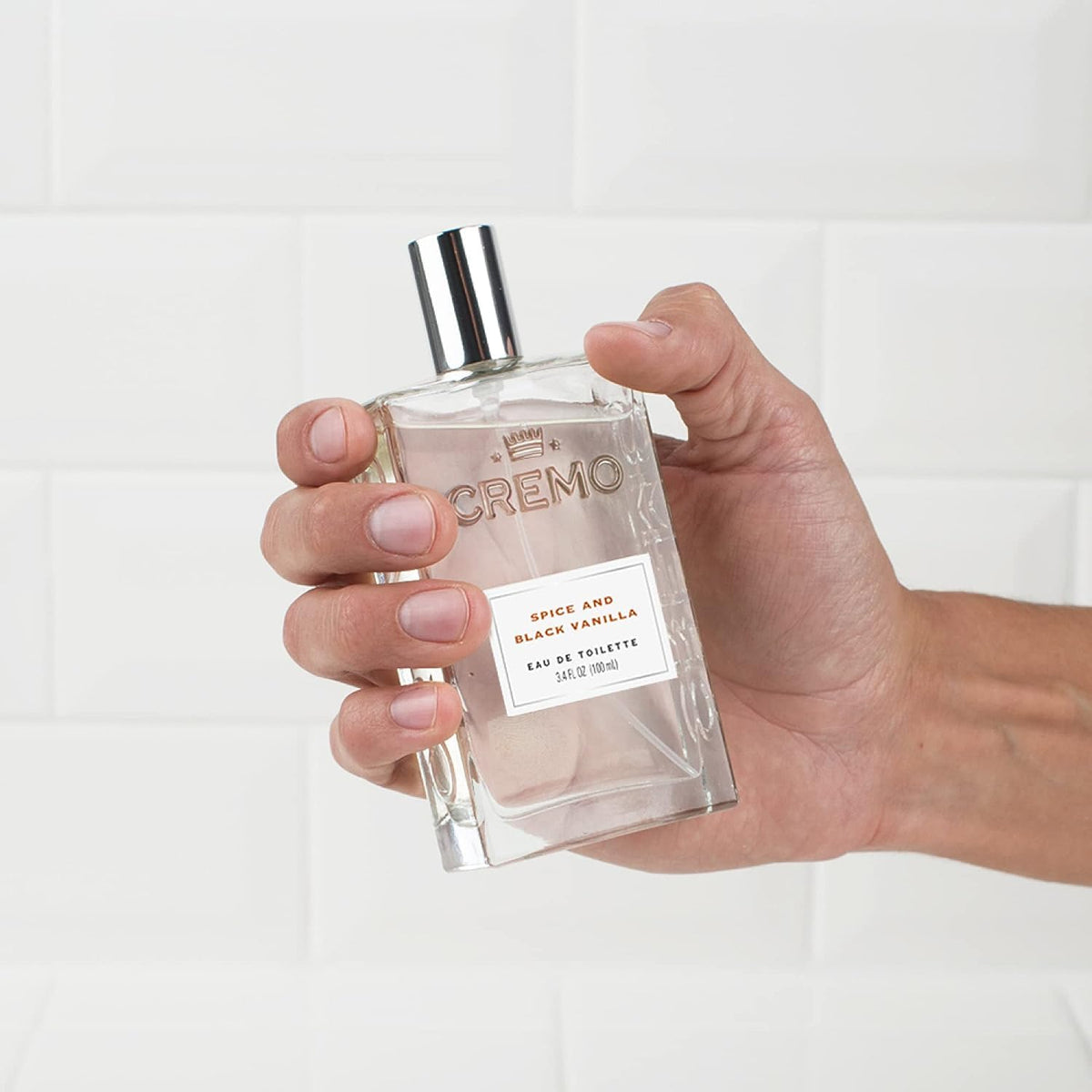 Cremo bottle on a bathroom counter conveying grooming routine integration benefit