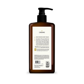 Cremo 32 fl oz bottle next to grooming essentials showing value and scale