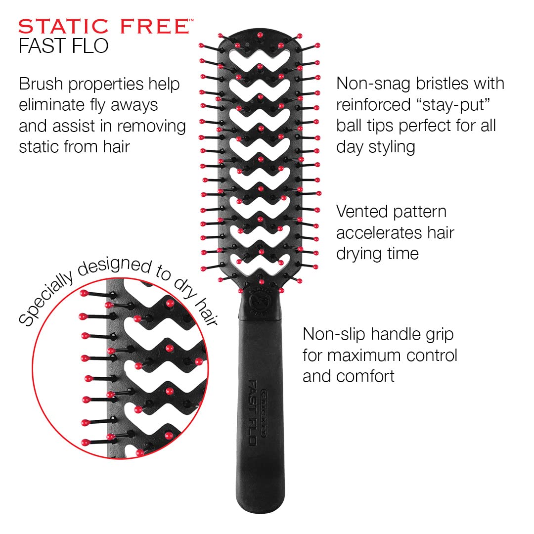 Cricket brush held in hand to show size and comfortable balance during use
