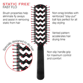 Cricket brush held in hand to show size and comfortable balance during use