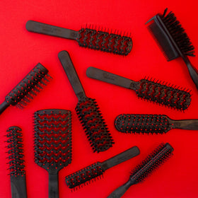 Cricket brush styled result on long hair showing smooth, frizz-reduced finish