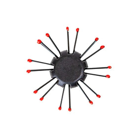 Cricket brush used on damp hair to detangle and prepare for blow-drying